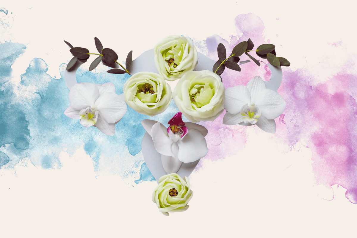 Decorative arrangement of flowers in the shape of a womb with watercolor background